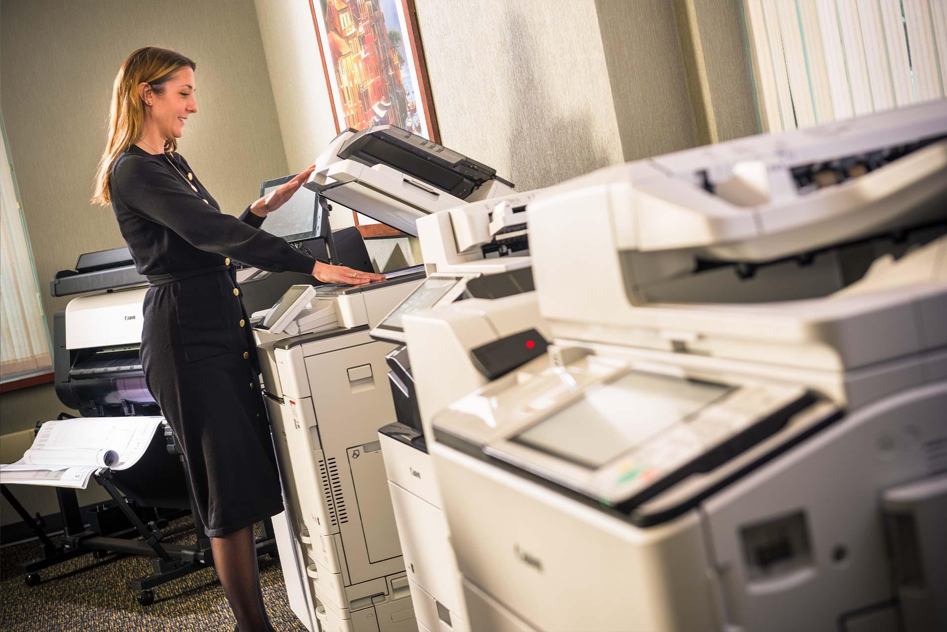 woman-using-copier-smiling