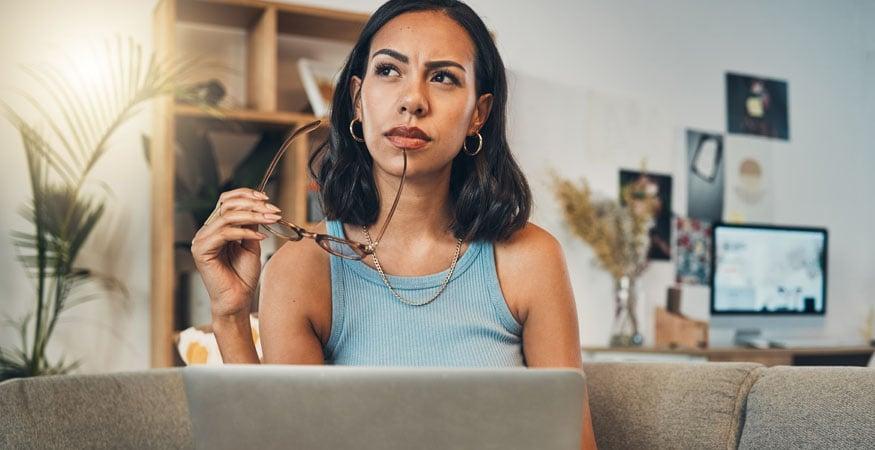 Woman weighing options before making a decision