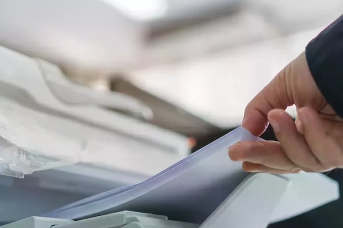 grabbing paper from a printer