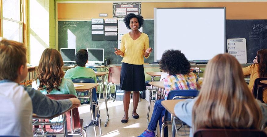 teacher in front of a classroom of students